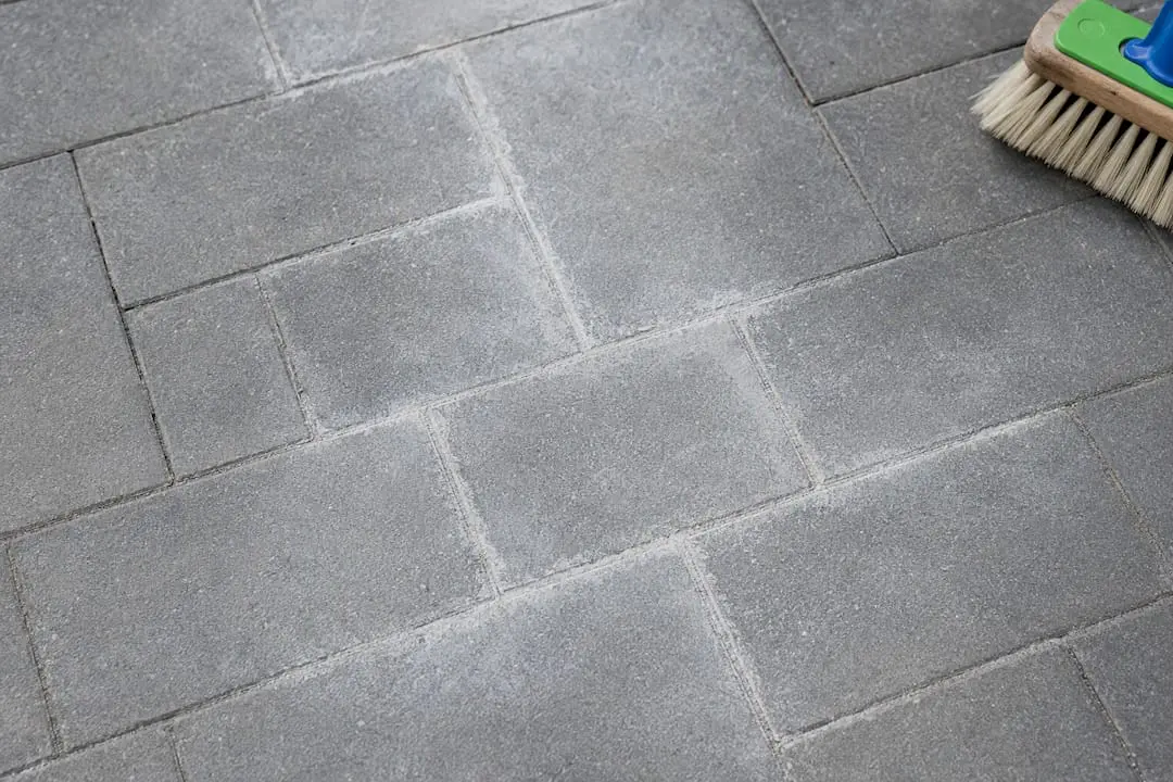White haze across polymeric sand joints