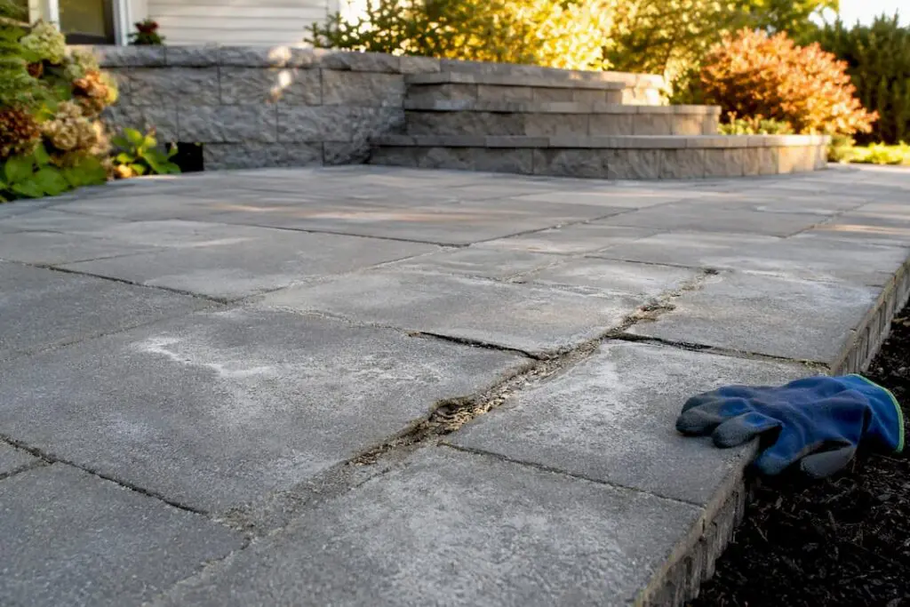 Failed polymeric sand joints on paver patio