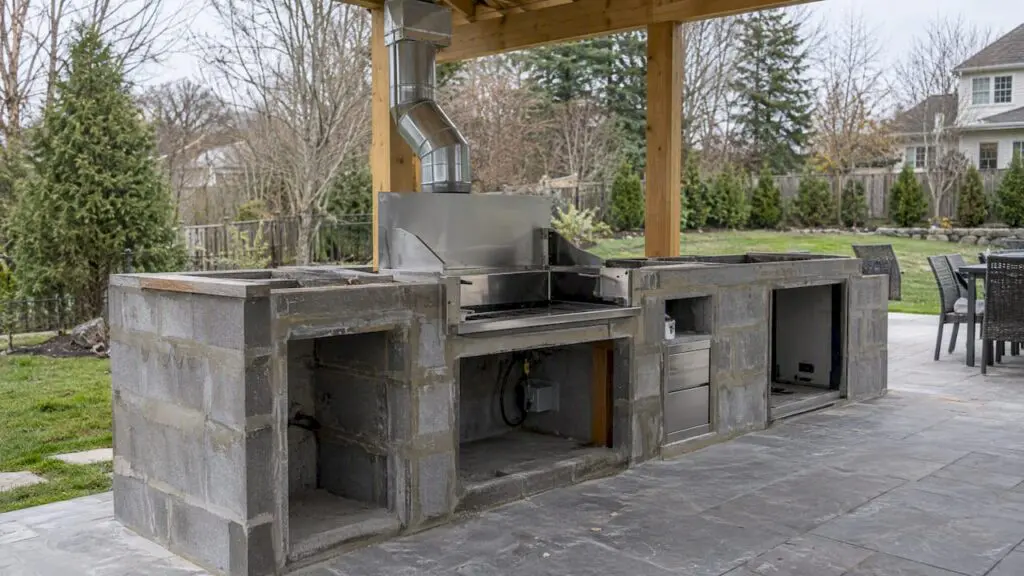 Outdoor kitchen ventilation planned before masonry